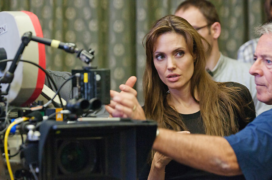first-time director Angelina Jolie on the set of the film The Land of Blood and Honey