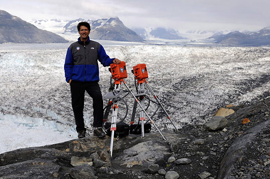 James Balog at Columbia Glacier, Alaska, with two time-lapse cameras in late August 2009.