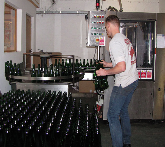 worker with bottling machine at Cantillon Brewery