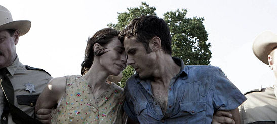 Casey Affleck as Bob and Rooney Mara as Ruth in a scene from the movie 'Ain't Them Bodies Saints'