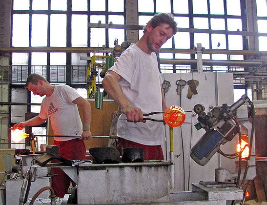 glass blowers at work at the Moser Glass factory