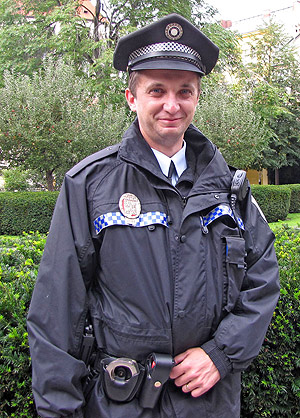 friendly police officer posing for a photograph