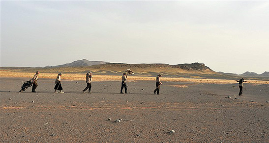 The Way Back cast trekking through desert terrain