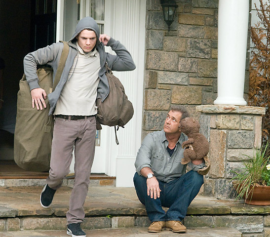 Anton Yelchin as porter Black with Mel Gibson in a scene from the movie The Beaver