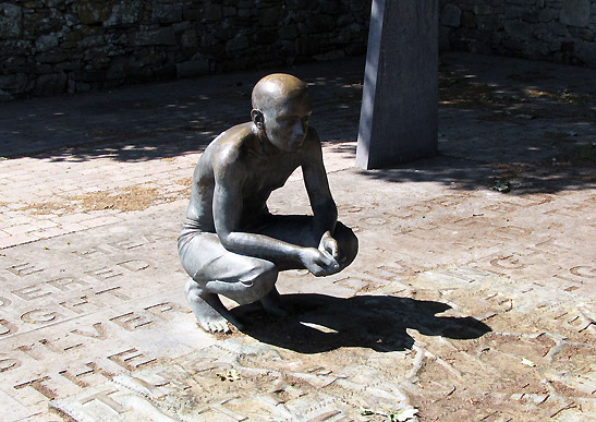 statue at the entrance to St. Columbia's Parish Church cemetery, Country Slago
