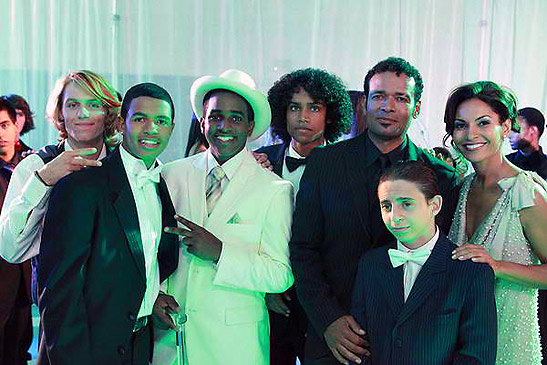 Mario Van Peebles as Dr. Sutton and Salli Richardson-Whitfield as Principal Reynolds (far right) with members of his class on prom night.