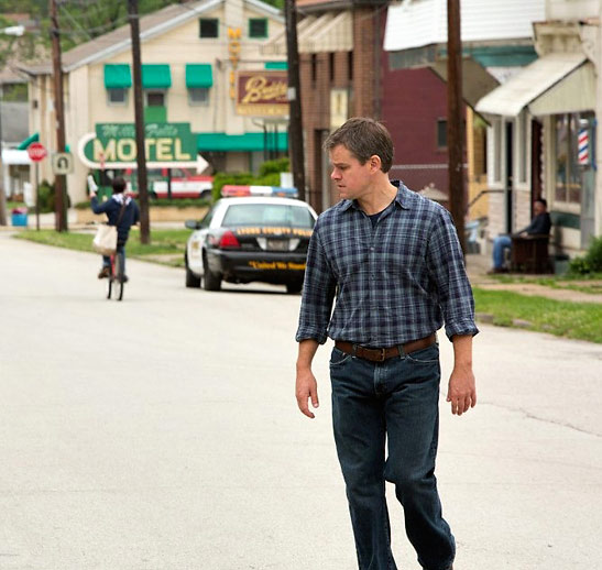 Matt Damon in a street scene from Promised Land