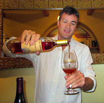 Rickey V of Casa Barranca Wines pours a wine for tasting