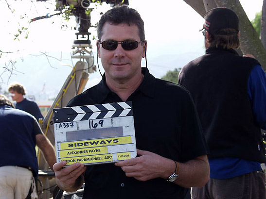 Rex Pickett holding plate on the set of the movie Sideways