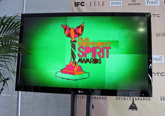 the Film Independent's Spirit Awards logo on display at a video screen in Santa Monica Beach, February 2011