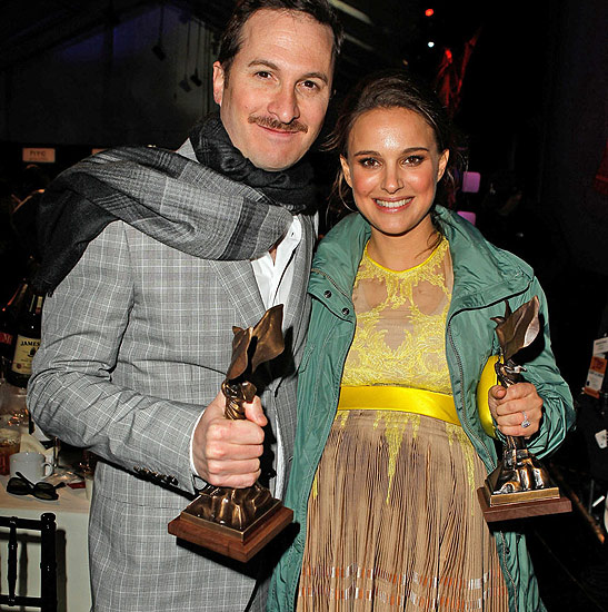 Darren Aronofsky and Natalie Portman with their awards at the Spirit Awards, Santa Monica Beach
