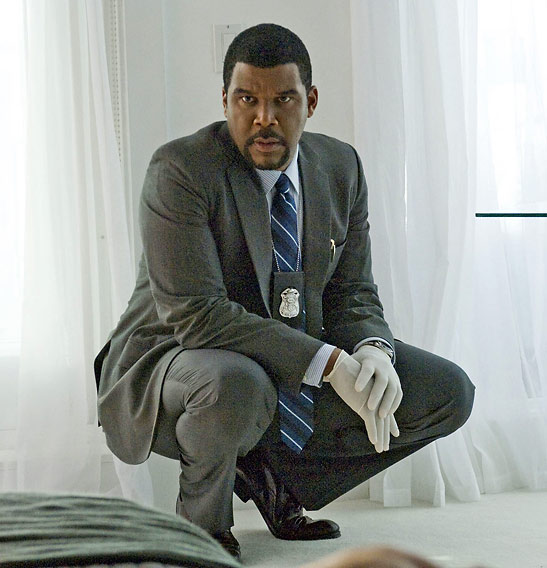 Tyler Perry at a crime scene from the movie 'Alex Cross'