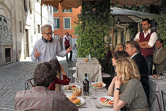 Woody Allen setting up a shot with the cast of 'To Rome With Love'