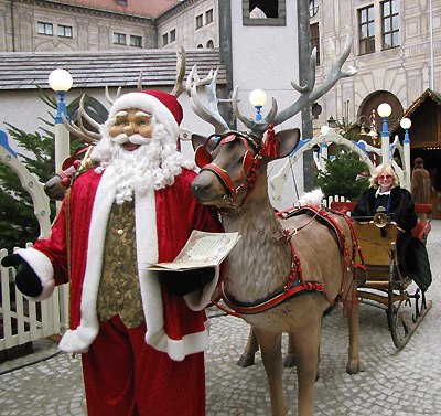 Santa Claus with reindeer and sled figures, alley in Zurich