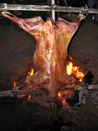 lamb being roasted outdoors at the Las Chicas Guesthouse, ViaWines vineyards