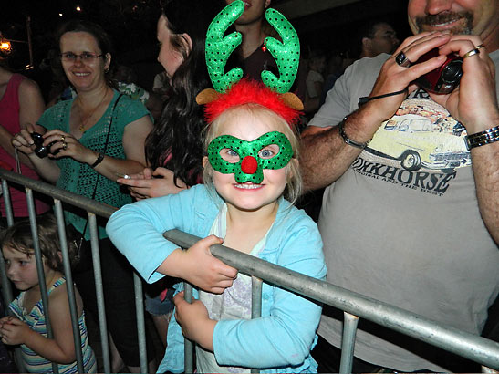 young girl awaiting Santa in a remote mining town along the Christmas Train route