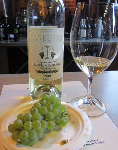 white wine and grapes at a tasting room at the Barrister, a Spokane winnery