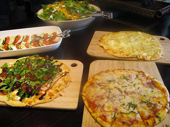 pizzas and salad at Bistro Rouge Café
