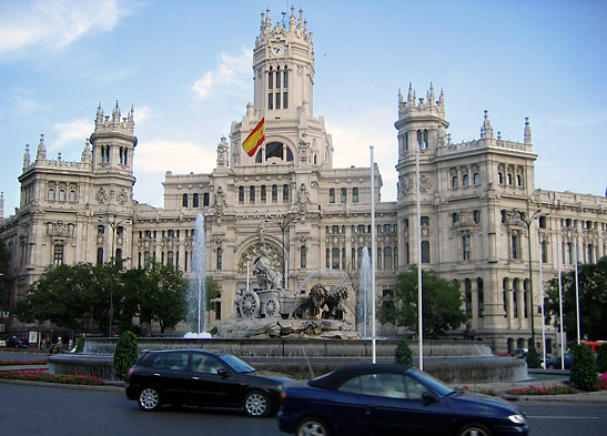 fountain at the Plaza de Cibeles with the main post office or Palacio de Communicaciones in the background, Madrid