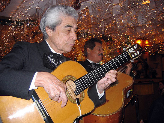 a Mariachi band performing at the Mi Tierra restaurant in San Anronio;s Market Square