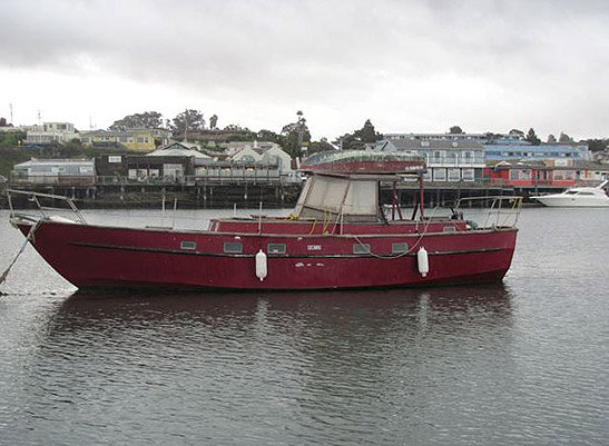 red boat in harbor