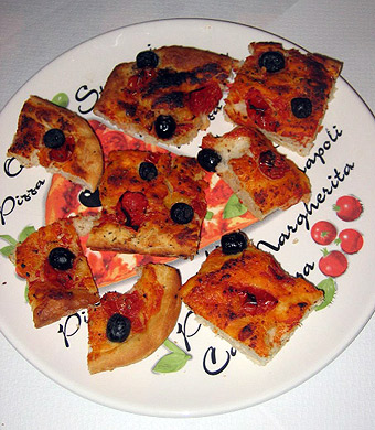 typical southern Italian fare: olive and tomato focaccia