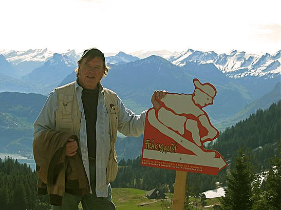 the writer at 7,000 feet overlooking Lake Lucerne with Alpine peaks in the background