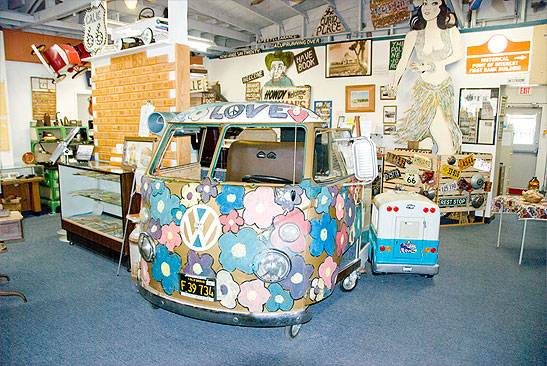 display inside the Route 66 Museum including a 1966 Volkswagen and classic teardrop trailer