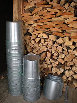 piles of buckets and wood at Mapletree Farm