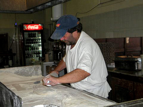rolling out the beignet dough at the Morning Call