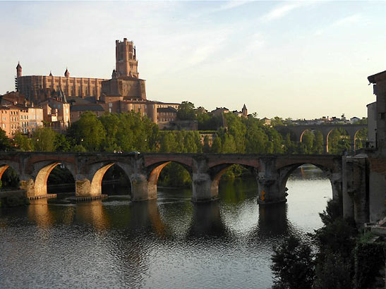 the fortress-cathedral of St. Cecile and old bridge across the Tarn River, Albi