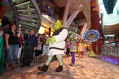 Shrek entertains the crowd at the Move it! Move it! parade aboard the Allure of the Seas