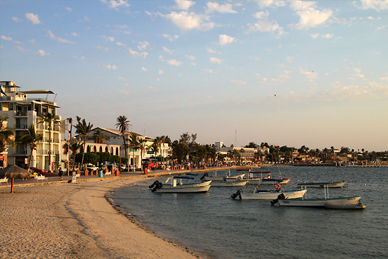 shops along a beach in La Paz