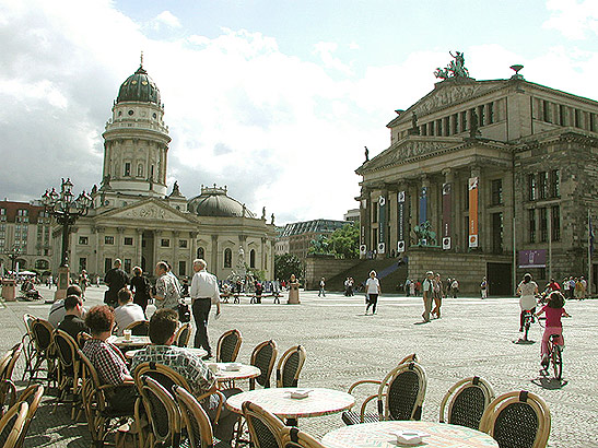 the Gendarmenmarket with dining tables in the foreground