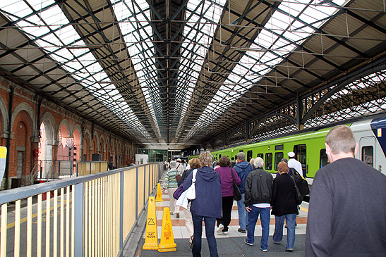commuters on a rail station, Ireland