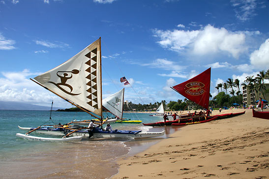 colorful masted canoes at Ka'anapali Beach