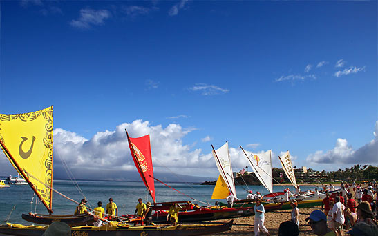 masted canoes lined up at Ka'anapali Beach for the race to Molokai