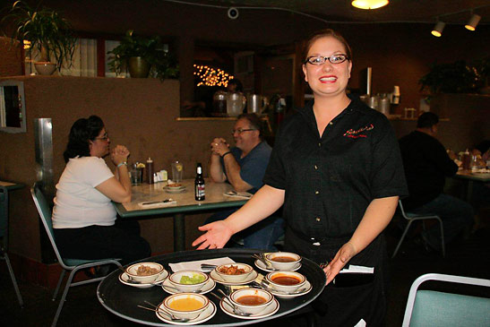 serving food at Sadie's of New Mexico 