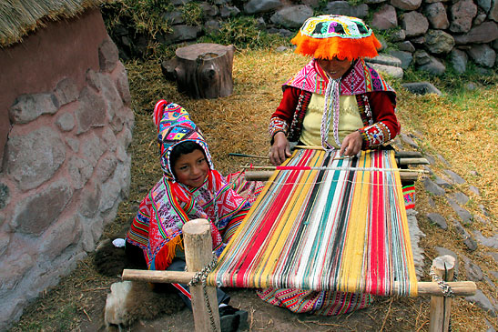 weaver and son in Cusco
