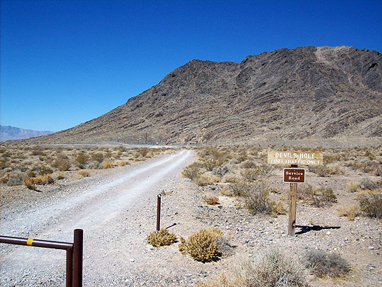 singpost leading to the Devil's Hole, Ash Meadows National Wildlife Refuge, Nevada
