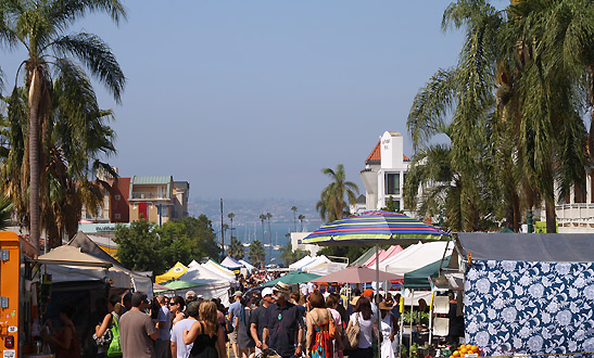 Saturday Farmer's Market Scene at Little Italy with the waterfront in the background