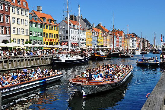 boatloads of visitors at the Kongens Nytorv, Copenhagen, Denmark