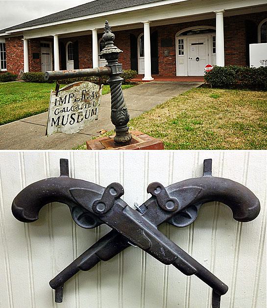 top: the Imperial Calcasieu Museum; bottom: replicas of duelling pistols hanging on the walls of the the Imperial Calcasieu Museum 