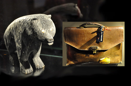 bear figurine that sat on Nobel Prize awardee Martti Ahtisaari's desk in Karelia, Finland; inset: worn briefcase of Australian Sir John Eccles