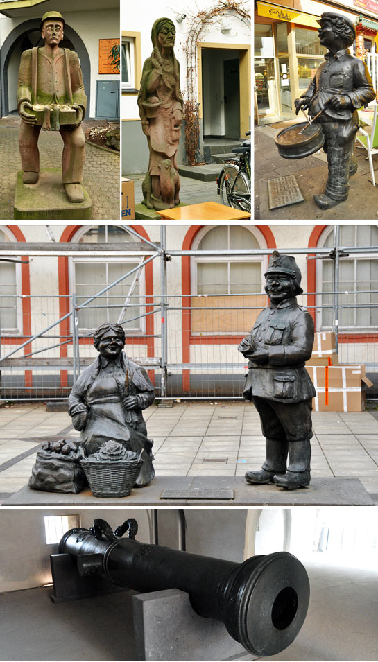 statues and an old gun barrel at the fortress, Koblenz