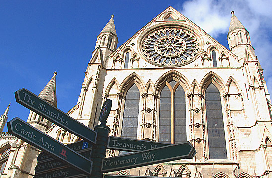 streetsigns and the front of Yorkminster cathedral