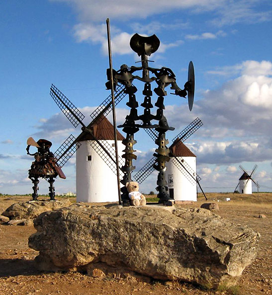 metal statue of Don Quixote with windmills in the background, La Mancha