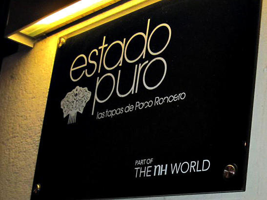 sign in front of the Estado Puro tapas restaurant, Madrid, Spain