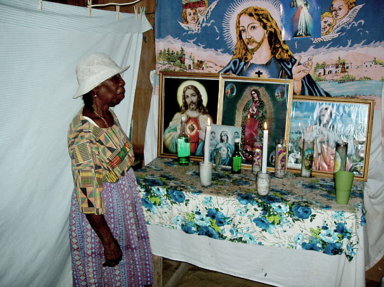 Garifuna healer in her sacred chamber, Belize