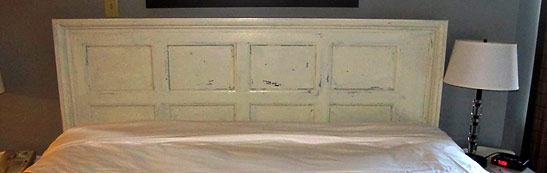 headboard made from a re-cycled door at the Green Suite, Digby Pines, Nova Scotia